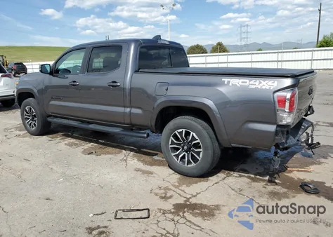 2021 Toyota Tacoma Double Cab z USA, uszkodzony, nr VIN 5TFDZ5BNXMX057980